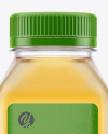 Download Clear Plastic Bottle With Apple Juice Mockup in Bottle Mockups on Yellow Images Object Mockups