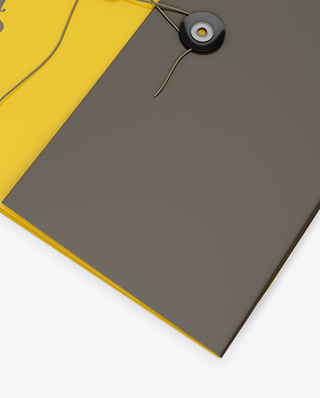 Matte Folder With String Closure - High-Angle Shot on Yellow Images