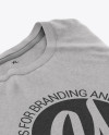 Folded Melange T-Shirt Mockup in Apparel Mockups on Yellow Images