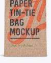 Download Kraft Paper Bag w/ a Metallic Paper Tin-Tie Mockup - Front View in Bag & Sack Mockups on Yellow ...