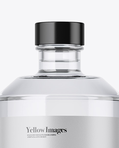 Download Clear Glass Vodka Bottle Mockup in Bottle Mockups on Yellow Images Object Mockups