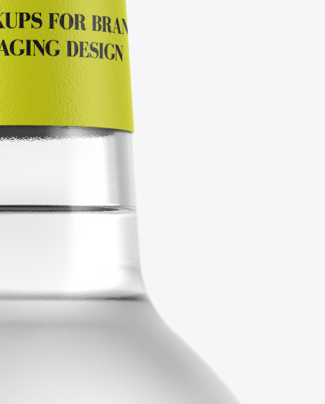 Clear Glass Bottle With Grappa Mockup on Yellow Images Object Mockups