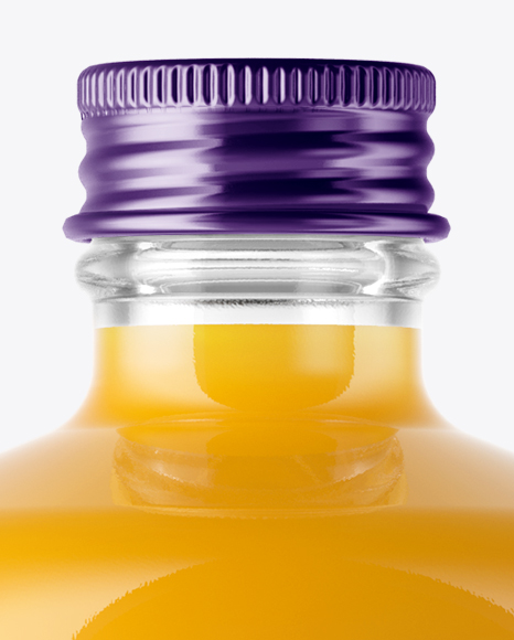 Clear Glass Bottle With Peach Juice Mockup PSD #1